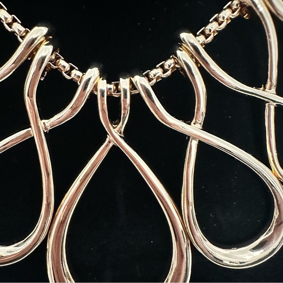 Erica Lyons shiny, gold toned, Infinity design bib necklace, statement piece. - Picture 10 of 10